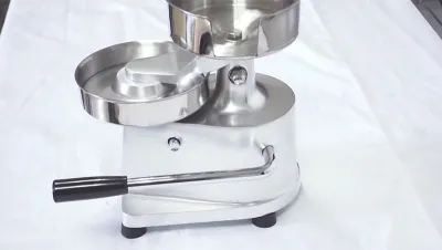 مكبس يدوي لتشكيل أقراص لحم برجر