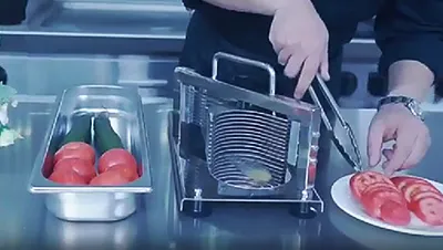 قطاعة الطماطم والخضروات اليدوية